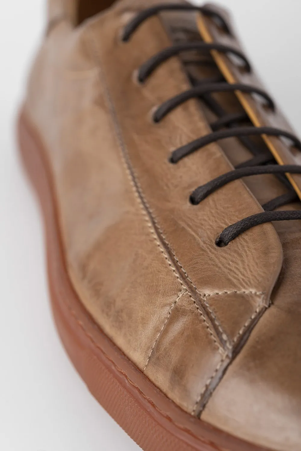 PUTNEY sand-dust latex sneakers.